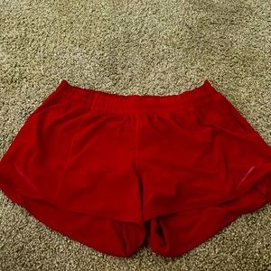 4” lululemon hotty hot dark red shorts.